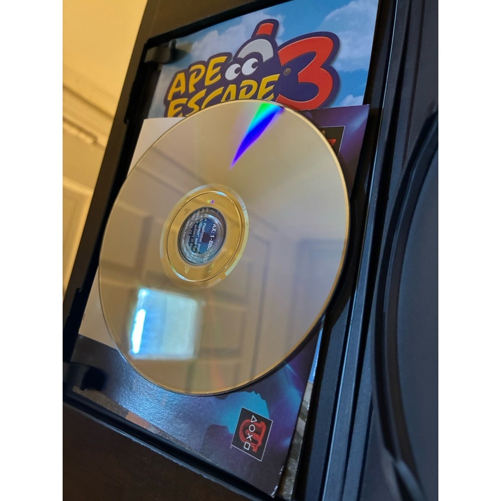 Ape Escape 3 (PS2, 2006) CIB - Very Good - Clean disc & Registration Card - Picture 3 of 3